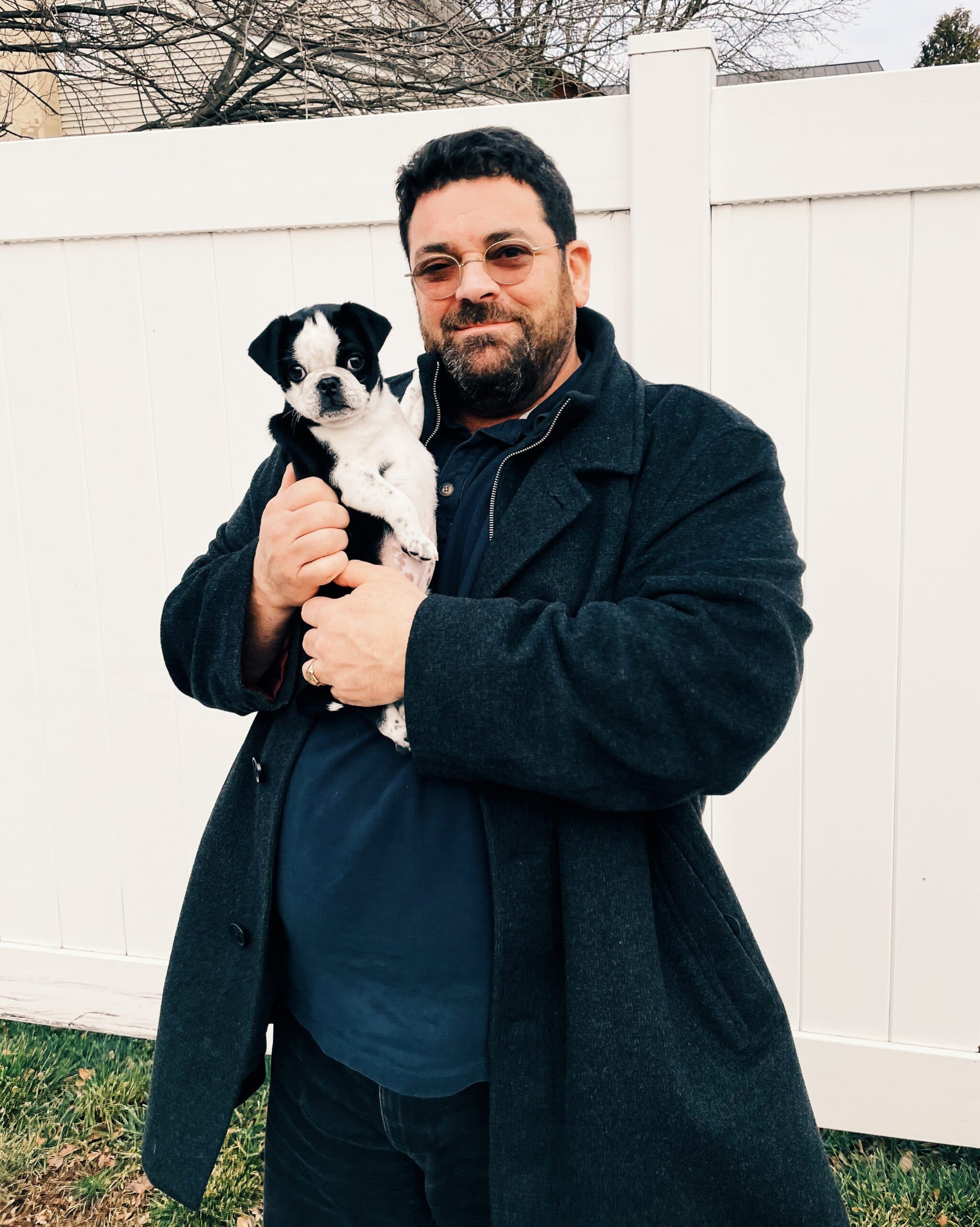 owner with pug puppy