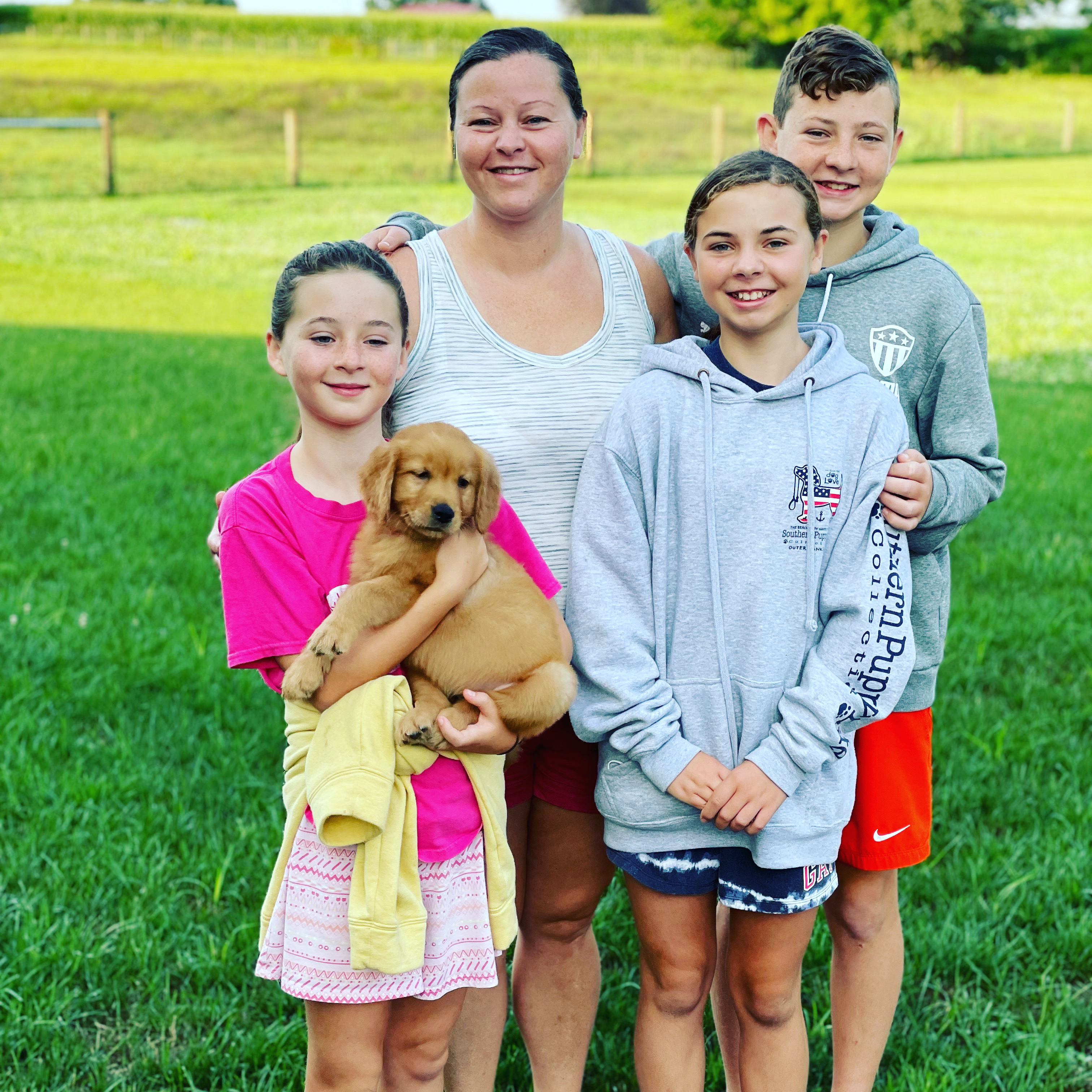 happy couple with rockvale puppy